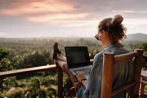 The Benefits of Offering Memberships to Remote Workers: Supporting Employee Well-Being in a Digital World - Business Woman On Laptop