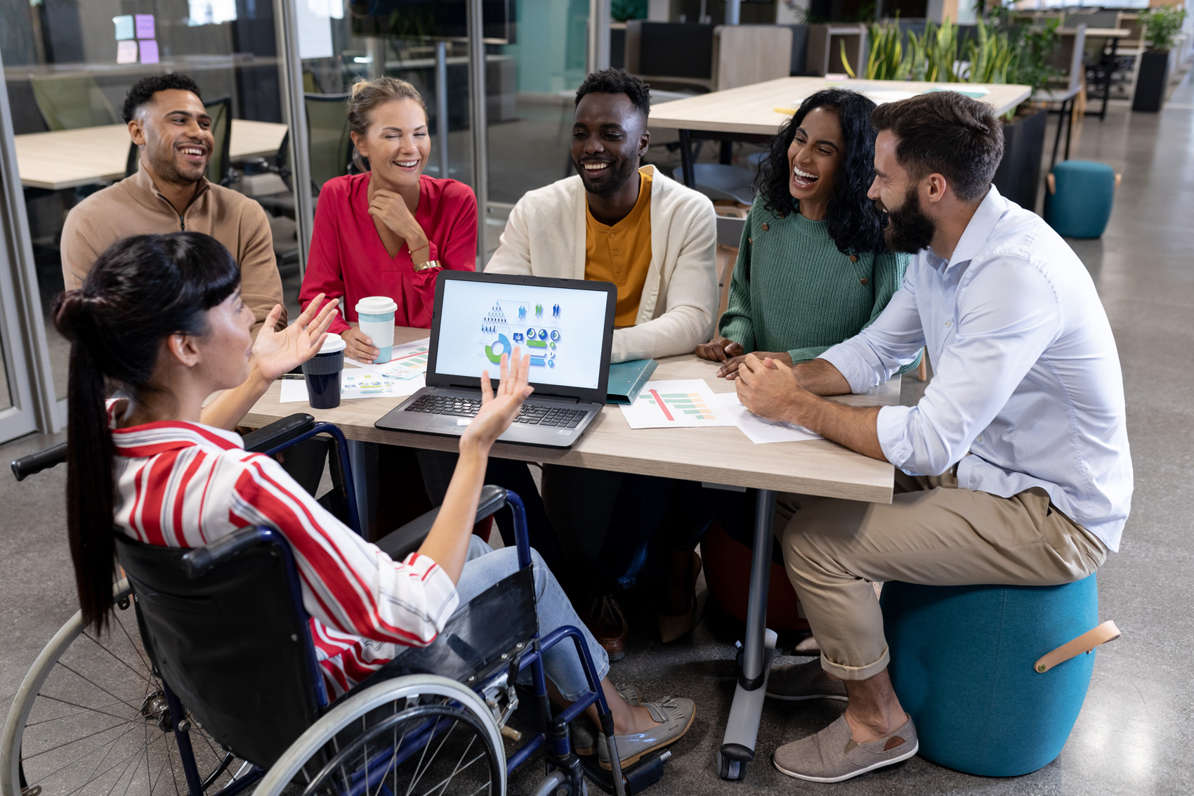 Business Woman in Meeting with Colleagues - Boosting Club Revenue