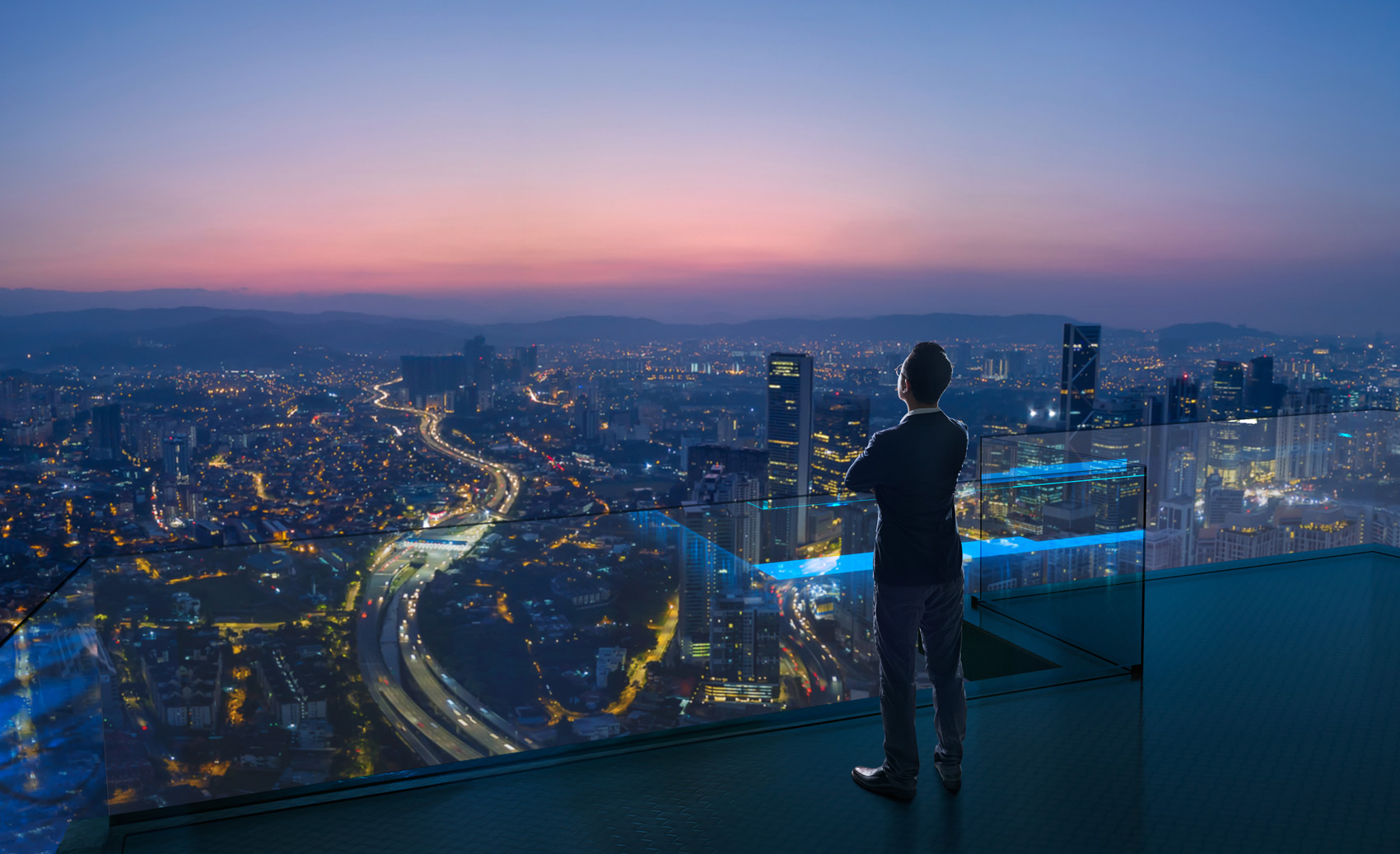 Businessman On Rooftop - The Future Of Work: Predictions For The Next Decade 