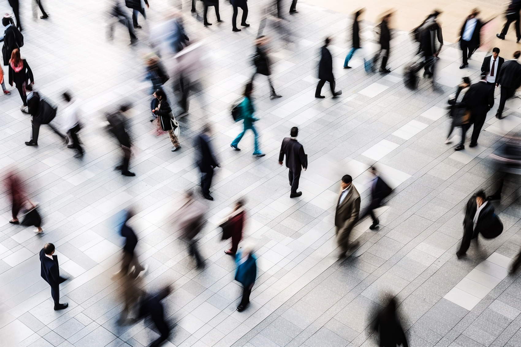 The Power Of Group Membership Purchasing - Aerial View of People In Motion Blur