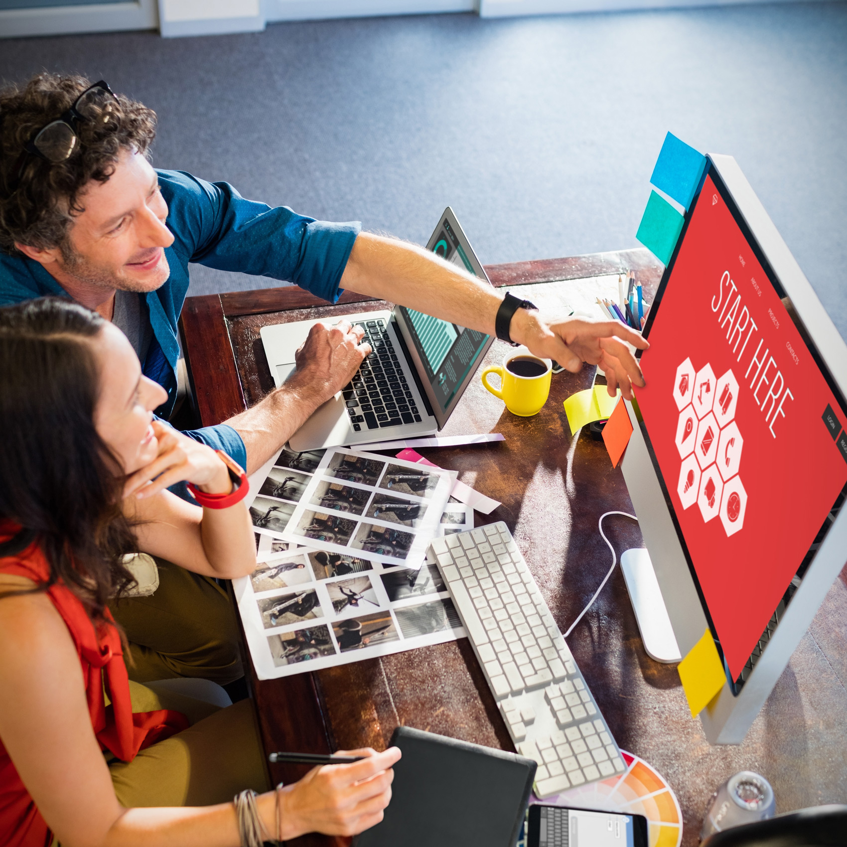 Two People Looking At Computer Screen - Smart Technology Investments