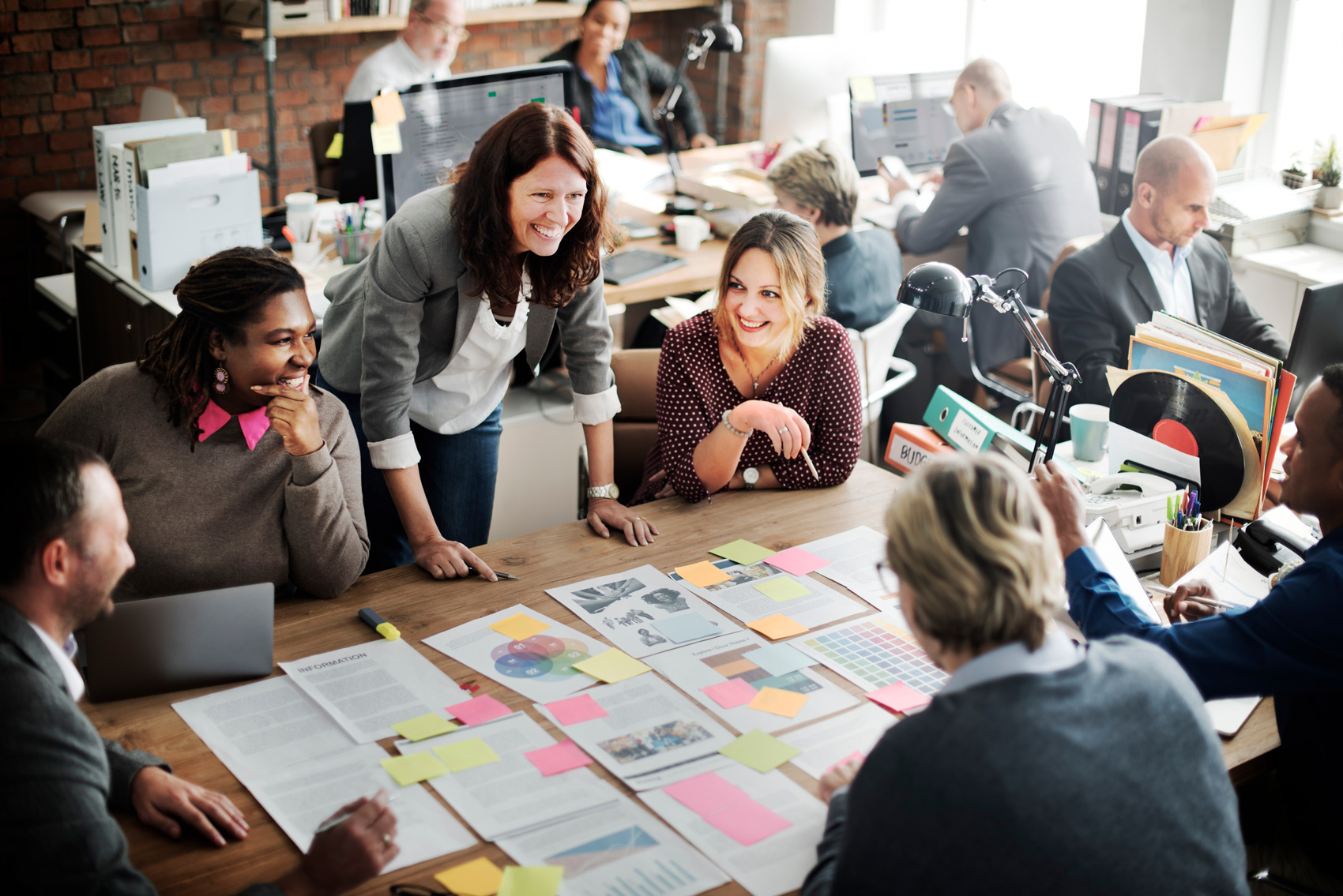 When To Add A New Member Benefit - Workers Contributing To A Teamwork Activity